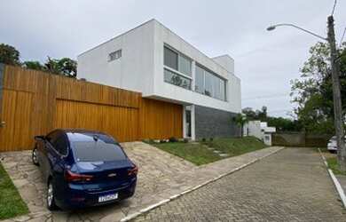 Imagem: A casa em condomínio possui 4 Dormitórios, 4 Banheiros, 5