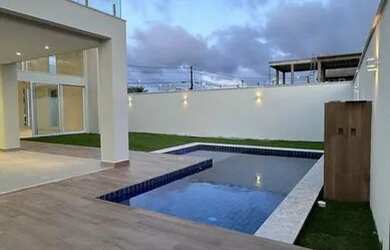 Imagem: A casa em condomínio possui 4 Dormitórios, 5 Banheiros, 5