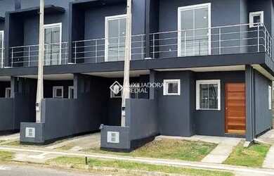 Imagem: A casa possui 2 Dormitórios, 1 Banheiro, 1 Vaga na garagem