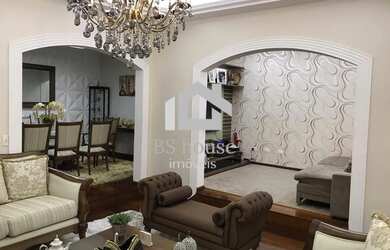 Imagem: A casa possui 4 Dormitórios, 5 Banheiros, 5 Vagas na garagem