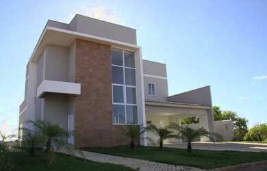 Imagem: A casa em condomínio possui 4 Dormitórios, 5 Banheiros, 336m²