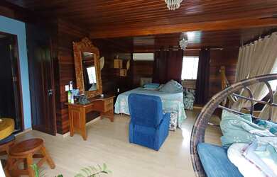 Imagem: A casa em condomínio possui 4 Dormitórios, 5 Banheiros, 5