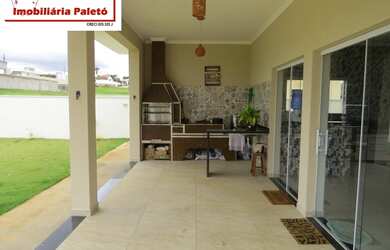 Imagem 9: Sobrado a venda no Ninho Verde, frente ao asfalto e lago do condomínio...