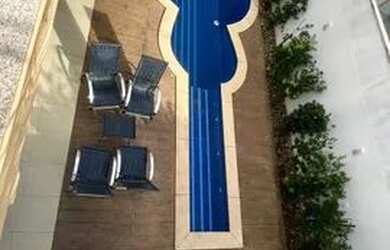 Imagem: A casa em condomínio possui 4 Dormitórios, 5 Banheiros, 4