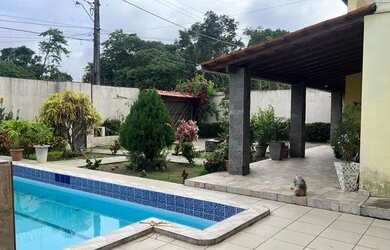 Imagem: A casa possui 5 Dormitórios, 1 Banheiro, 5 Vagas na garagem