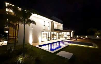 Imagem: A casa em condomínio possui 4 Dormitórios, 5 Banheiros, 4