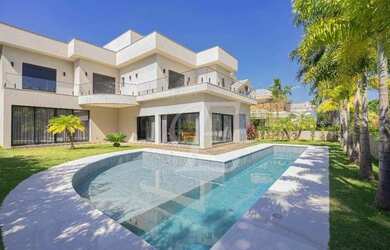 Imagem: A casa em condomínio possui 5 Dormitórios, 5 Banheiros, 5