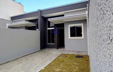 Imagem: A casa possui 2 Dormitórios, 1 Banheiro, 2 Vagas na garagem