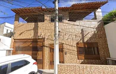 Imagem: A casa possui 4 Dormitórios, 3 Banheiros, 5 Vagas na garagem