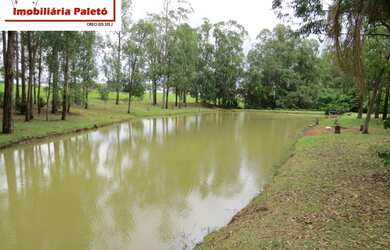 Imagem 4: Sobrado a venda no Ninho Verde, frente ao asfalto e lago do condomínio...