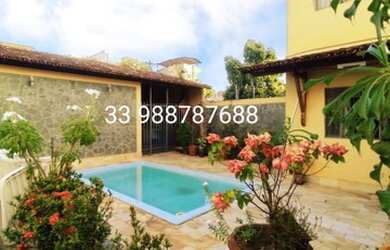 Imagem: A casa possui 4 Dormitórios, 4 Banheiros, 5 Vagas na garagem