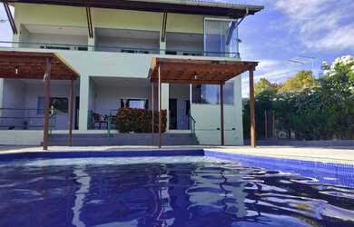 Imagem: A casa em condomínio possui 5 Dormitórios, 5 Banheiros, 4