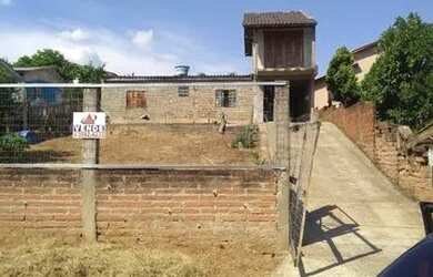 Imagem: A casa e possui 2 Dormitórios, Suítes, 2 Banheiros, 1 Vaga