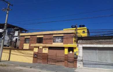 Imagem: A casa à venda possui 5 Dormitórios, 4 Banheiros, 2 Vagas