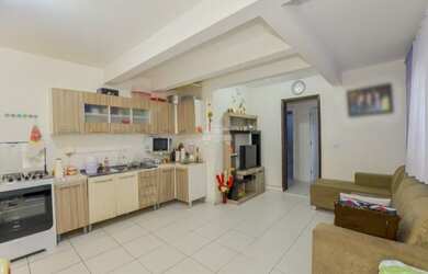 Imagem: A casa possui 4 Dormitórios, 2 Banheiros, 2 Vagas na garagem