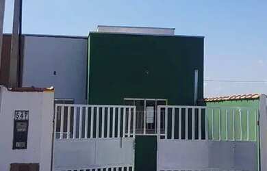 Imagem: A casa possui 2 Dormitórios, 1 Banheiro, 2 Vagas na garagem