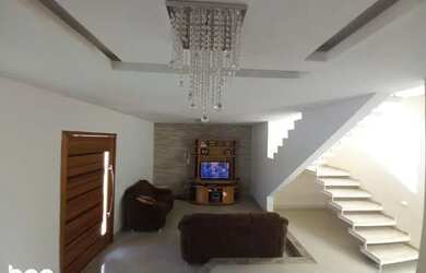 Imagem: A casa possui 3 Dormitórios, 4 Banheiros, 5 Vagas na garagem