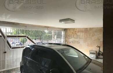 Imagem: A casa possui 3 Dormitórios, 2 Banheiros, 2 Vagas na garagem