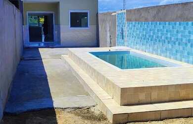 Imagem: A casa possui 2 Dormitórios, 2 Banheiros, 3 Vagas na garagem