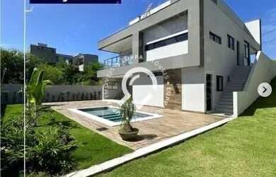 Imagem: A casa possui 5 Dormitórios, 5 Banheiros, 4 Vagas na garagem