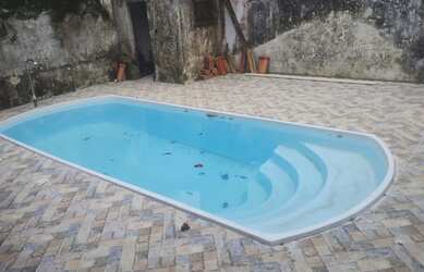 Imagem: A casa possui 4 Dormitórios, 5 Banheiros, 4 Vagas na garagem