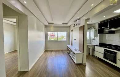 Imagem: O apartamento possui 2 Dormitórios, 1 Banheiro, 1 Vaga na garagem