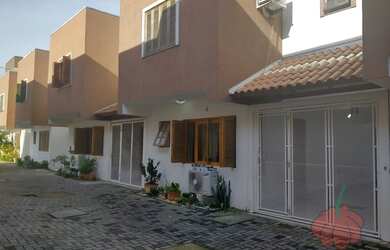 Imagem: A casa em condomínio possui 3 Dormitórios, 3 Banheiros, 2