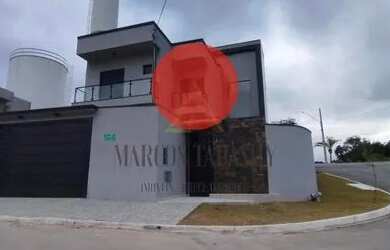 Imagem: A casa possui 2 Dormitórios, 3 Banheiros, 2 Vagas na garagem