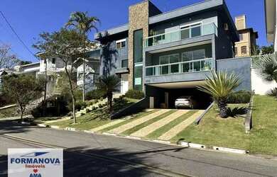 Imagem: A casa em condomínio possui 3 Dormitórios, 4 Banheiros, 5