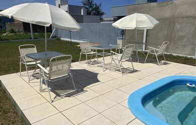 Imagem: A casa possui 4 Dormitórios, 4 Banheiros, 4 Vagas na garagem