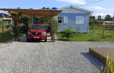 Imagem: A casa possui 2 Dormitórios, 1 Banheiro, 1 Vaga na garagem
