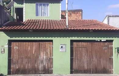 Imagem: A casa possui 2 Dormitórios, 2 Banheiros, 3 Vagas na garagem