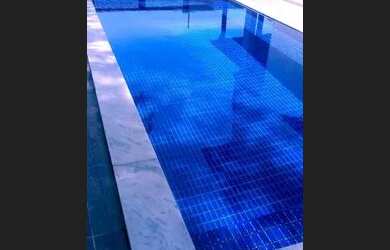 Imagem: A casa possui 2 Dormitórios, 3 Banheiros e 5 Vagas na garagem