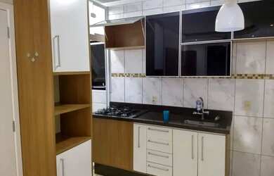 Imagem: O apartamento possui 2 Dormitórios, 1 Banheiro, 1 Vaga na garagem