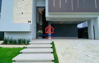 Imagem: A casa possui 4 Dormitórios, 5 Banheiros, 2 Vagas na garagem