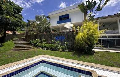 Imagem: A casa possui 4 Dormitórios, 5 Banheiros, 5 Vagas na garagem