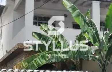 Imagem: A casa possui 3 Dormitórios, 5 Banheiros, 4 Vagas na garagem