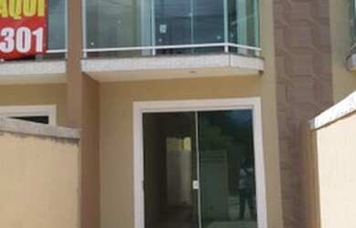 Imagem: A casa possui 2 Dormitórios, 1 Banheiro, 1 Vaga na garagem