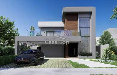 Imagem: A casa possui 3 Dormitórios, 4 Banheiros, 2 Vagas na garagem