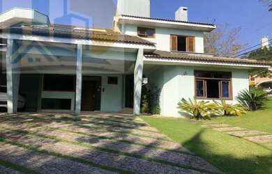 Imagem: A casa em condomínio possui 4 Dormitórios, 5 Banheiros, 5