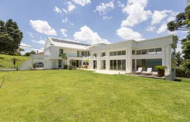 Imagem: A casa em condomínio possui 4 Dormitórios, 5 Banheiros, 5