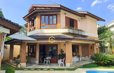 Imagem: A casa em condomínio possui 4 Dormitórios, 5 Banheiros, 5