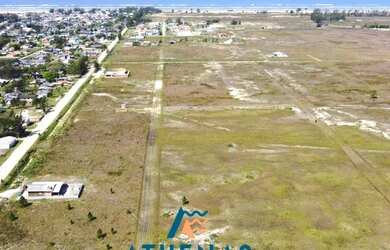 Imagem 2: TERRENO ESCRITURADO FRENTE LESTE NA PRAIA EM ATÉ 96x