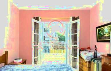 Imagem: A casa possui 3 Dormitórios, 4 Banheiros, 2 Vagas na garagem