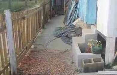 Imagem: A casa possui 2 Dormitórios, 1 Banheiro, 2 Vagas na garagem