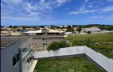 Imagem: A casa possui 4 Dormitórios, 2 Banheiros, 5 Vagas na garagem