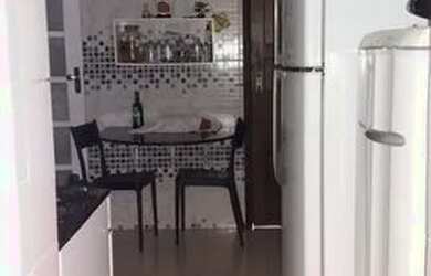 Imagem: A casa possui 3 Dormitórios, 1 Banheiro, 2 Vagas na garagem