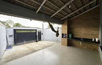 Imagem: A casa possui 2 Dormitórios, 1 Banheiro, 2 Vagas na garagem