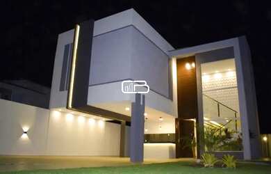 Imagem: A casa possui 3 Dormitórios, 4 Banheiros, 4 Vagas na garagem