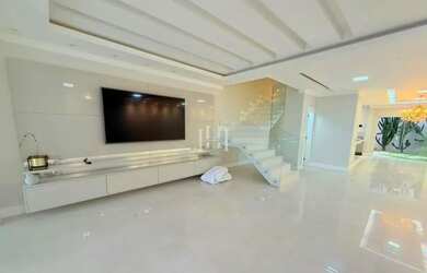 Imagem: A casa em condomínio possui 4 Dormitórios, 5 Banheiros e 400m²